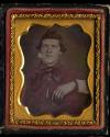 [Young man in red shirt, smoking a clay pipe]
