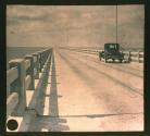 [Gandy Bridge with a single stopped car on it]