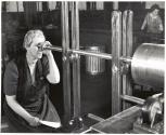 Production: 105 mm. Howitzers. Norma K. Jones used to be a high-school teacher and now teaches two nights a week. She inspects 105 mm. howitzers in the Milwaukee, Wis. plant of the Chain Belt Co.