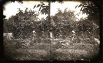 [Mrs. Charles Forbes (Libby) in garden at 26 Tremont St.]