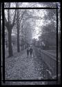 [James Forbes and another boy on sidewalk]