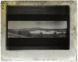 [Copy photograph of mountain lake]