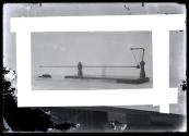 [Longitudinal vibration apparatus]