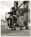 [Austria, children on steps of a destroyed building]
