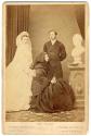 [Queen Victoria and the Prince and Princess of Wales (on their wedding day) with bust of Prince Albert.]