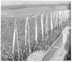 [Overview of crowds at outdoor rally]