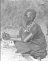 Portait of an Older Samburu Woman, Squatting