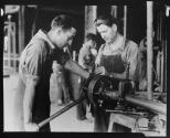 [Plumbers using pipe threader, Empire State building]