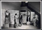 [Students working on mural panels]