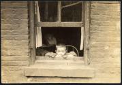 [Tenement child with a blank wall to stare at -]