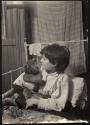 Sick child in N.Y. tenement, 1905