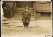 [Child at curb]
