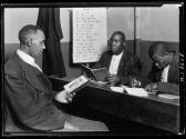 [Three men in a literacy class in a southern community]