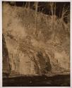 [Wooded hillside]