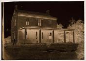 [Federal-style house with front porch, laundry spread on lawn, Pompton New Jersey?]