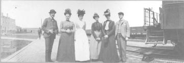 George Eastman and companions beside train, California Trip