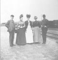 George Eastman and companions at train station, California Trip