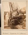 [Gunner Thomas C. Cuddy standing next to cannons, Simon's Bay, South Africa]