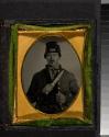 [Civil War soldier in full uniform, holding knife]
