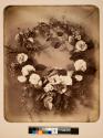 [Wreath of flowers]