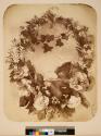 [Wreath of flowers]