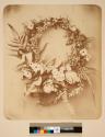 [Wreath of flowers]