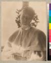 [Woman wearing long necklace, possibly Mrs. Frank Lily]