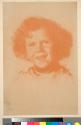 [Child with curly hair]