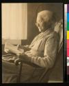 [Elderly woman reading]