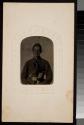 [Seated soldier with two duty weapons in belt]