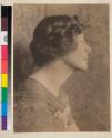 [Woman with braided hair]