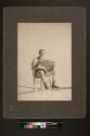 [Aerialist William Witaschek, "The Great Calvert" reading newspaper on the high wire]