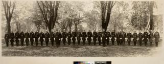 [Rochester policemen posed on the grounds of the Memorial Art Gallery, behind Anderson Hall, University of Rochester Campus]