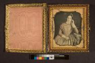 [Portrait of woman in plaid dress]