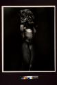 [Low key nude standing, solarized 1940s]