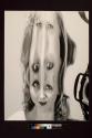 [Distorted portrait]