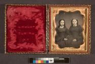 [Two girls with hair in ringlets]