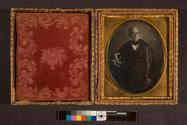 [Portrait of a man wearing cape]