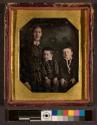 [portrait of woman with two small boys]