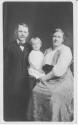 Mr. and Mrs. C. Allen and Grandchild