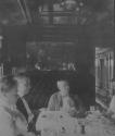 Travel companions dining in railroad car, Western Trip