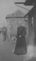Maria Eastman on railroad platform, Western Trip