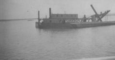 Barge and dredger in Michigan, Western Trip