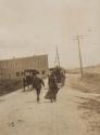 Travel companions behind carriages, Western Trip