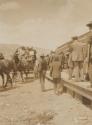 Horse drawn wagon approaching railroad platform, Western Trip