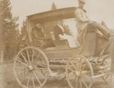 Maria Eastman and nurse in wagon at Yellowstone National Park, Western Trip