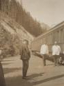 George Eastman photographing porters beside train, Western Trip