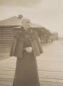 Maria Eastman on railroad platform, Western Trip