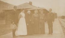 George Eastman and companions on railroad platform, Western Trip