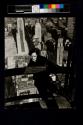 [Man on girders, mooring mast, Empire State Building]